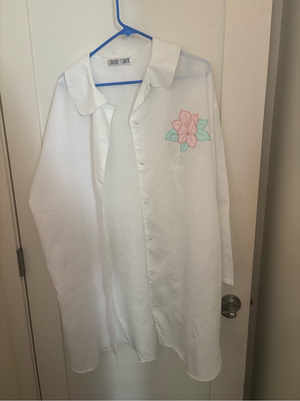 Chic Oversized White Button-Up Blouse with Pink Floral Embroidery